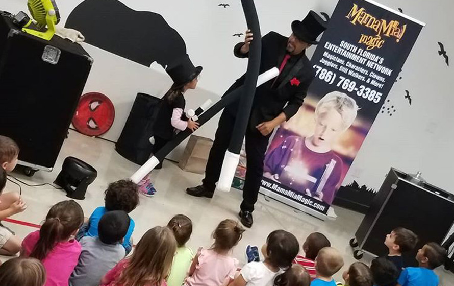 Costumed character entertaining party guests